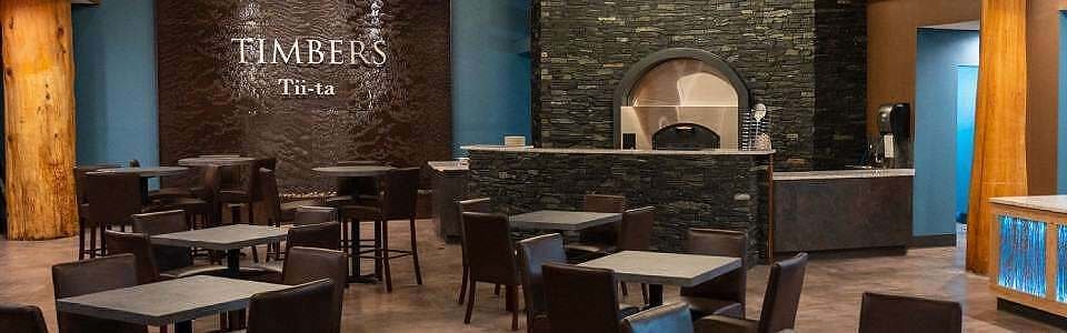 Brown-Copper-Speckled-Painted-Scored-Acrylic-Aquafall-Water-Wall-with-Logo-at-The-Mill-Casino-in-North-Bend-Oregon