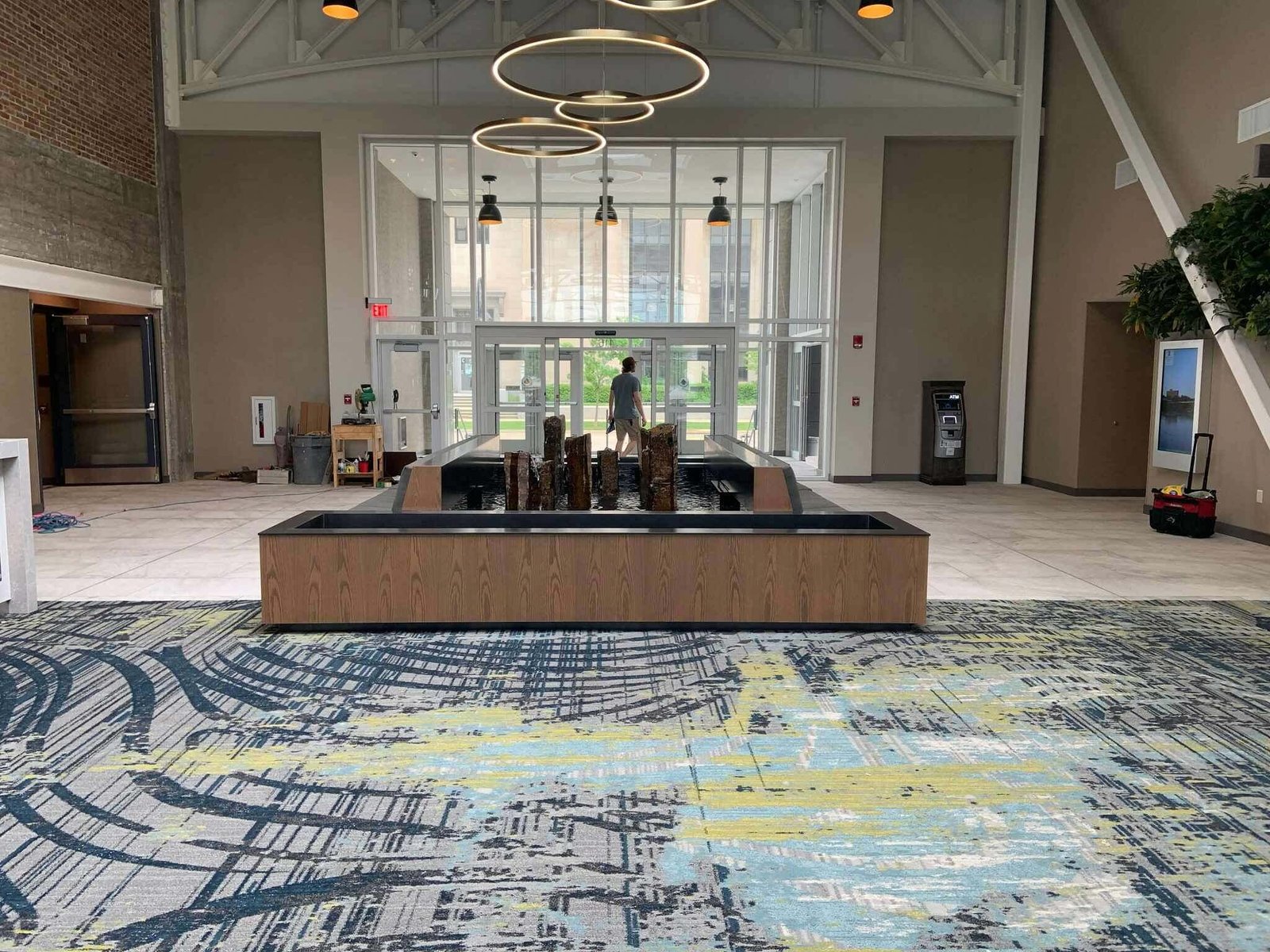 Reflection-Pool-with-Stone-Sculptures-Overflowing-scaled-1-1