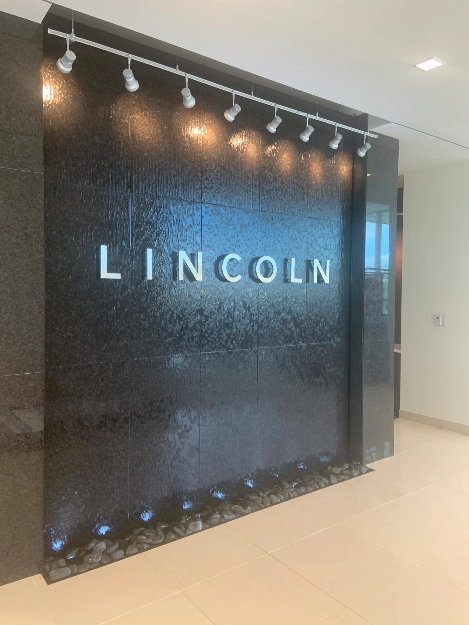 Black granite waterfall for west point lincoln in sugar land texas scaled