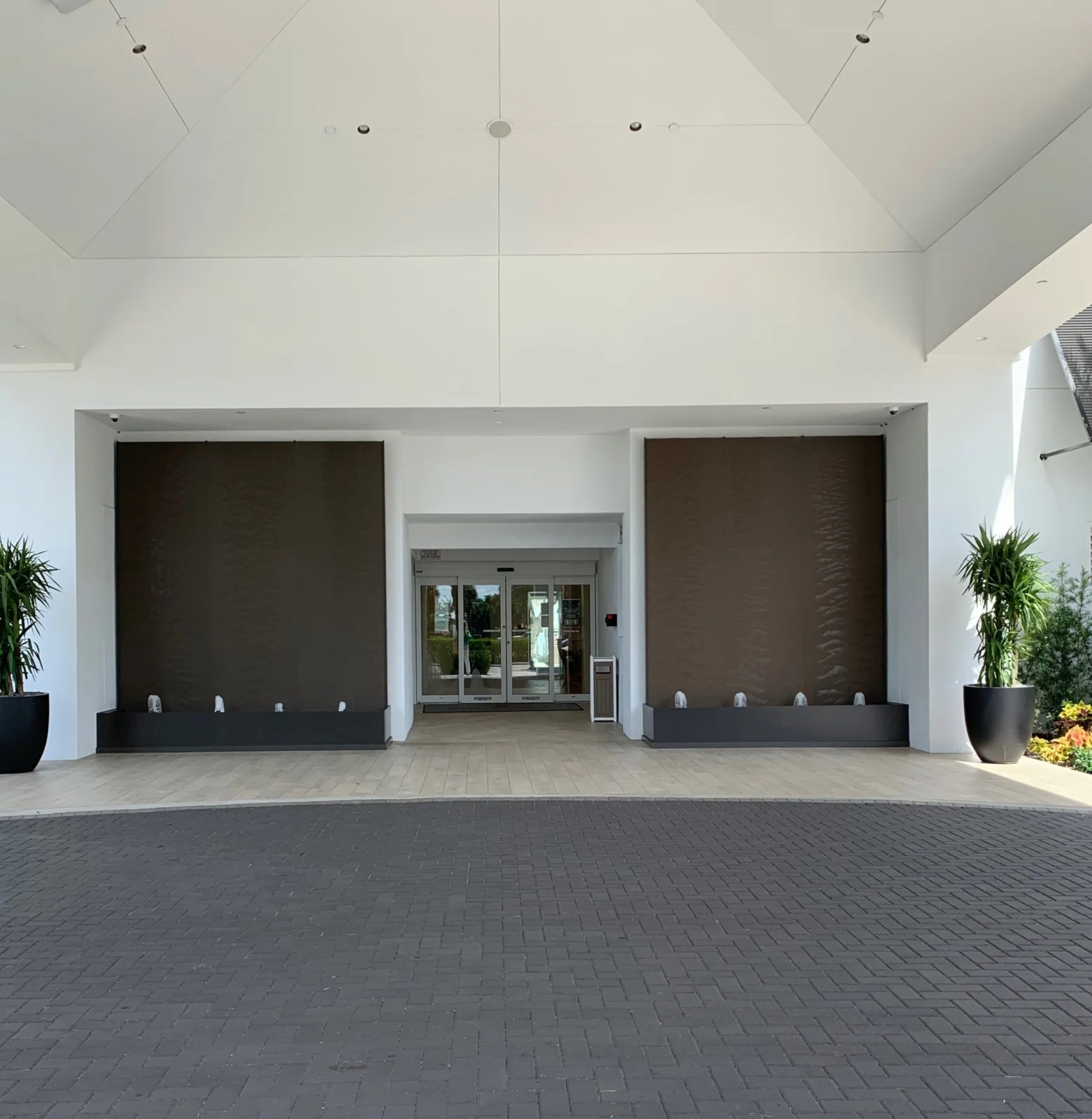 Brown copper painted scored acrylic aquafalls with reflection pool basin and bubbler jets at beachcomber resort club in pompano beach florida 2 800x800@2x.jpg