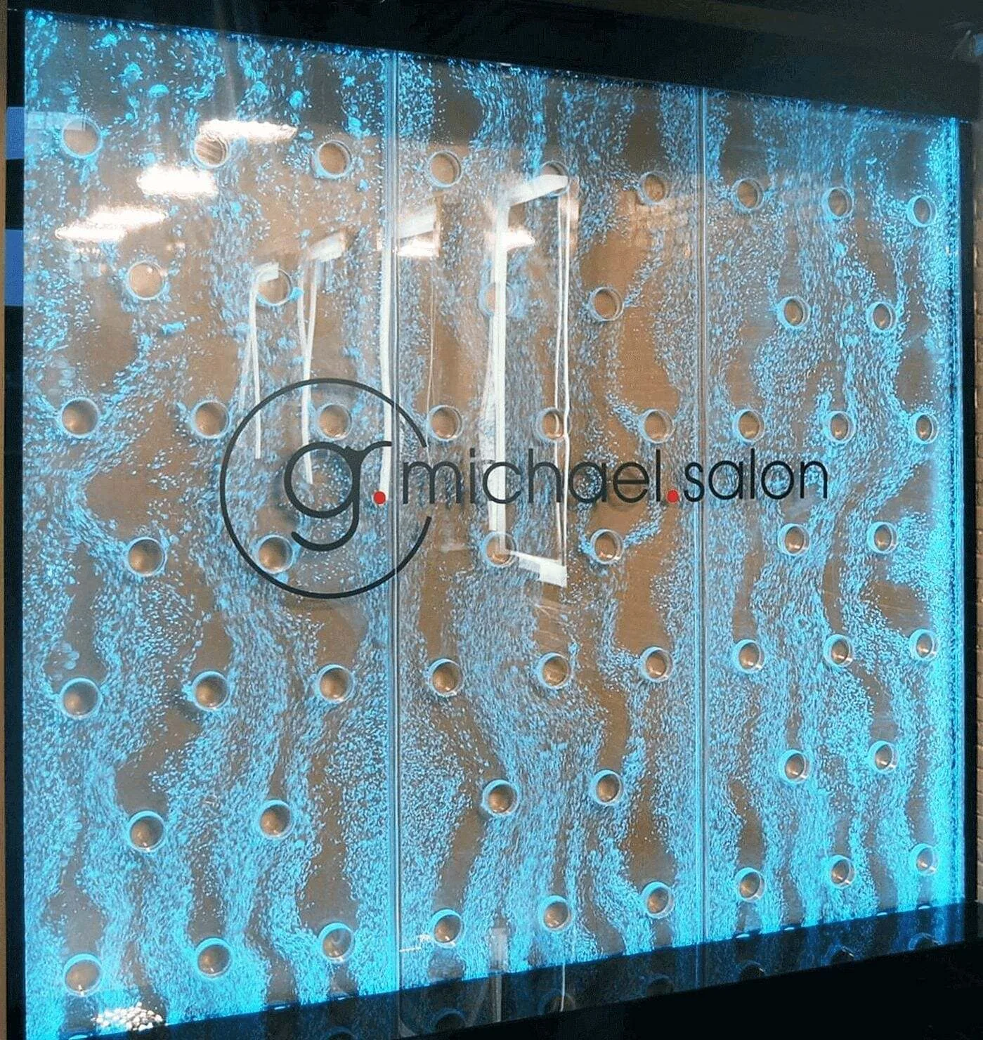 Bubble wall water feature g michael salon in enclosed water feature blue 1